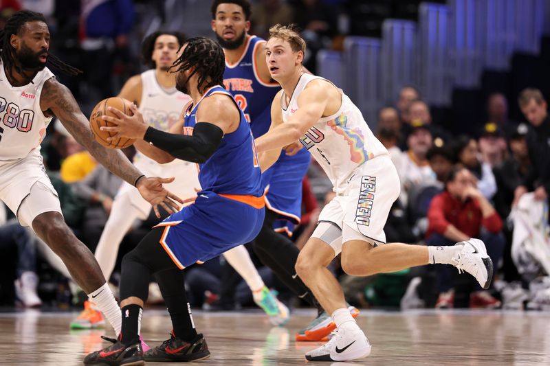 DENVER, COLORADO - NOVEMBER 25: Hunter Tyson #5 of the Denver Nuggets defends Jalen Brunson #11 of the New York Knicks during the second half at Ball Arena on November 25, 2024 in Denver, Colorado. NOTE TO USER: User expressly acknowledges and agrees that, by downloading and/or using this Photograph, user is consenting to the terms and conditions of the Getty Images License Agreement. (Photo by Justin Tafoya/Getty Images)