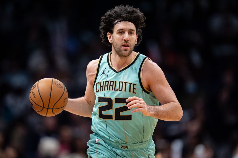 CHARLOTTE, NORTH CAROLINA - JANUARY 31: Vasilije Micic #22 of the Charlotte Hornets brings the ball up court in the third quarter during their game against the LA Clippers at Spectrum Center on January 31, 2025 in Charlotte, North Carolina. NOTE TO USER: User expressly acknowledges and agrees that, by downloading and or using this photograph, User is consenting to the terms and conditions of the Getty Images License Agreement. (Photo by Jacob Kupferman/Getty Images)