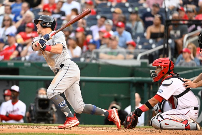 Apr 15, 2023; Washington, District of Columbia, USA; Cleveland Guardians center fielder Myles Straw (7) hits an RBI single against the Washington Nationals during the fourth inning at Nationals Park. Mandatory Credit: Brad Mills-USA TODAY Sports