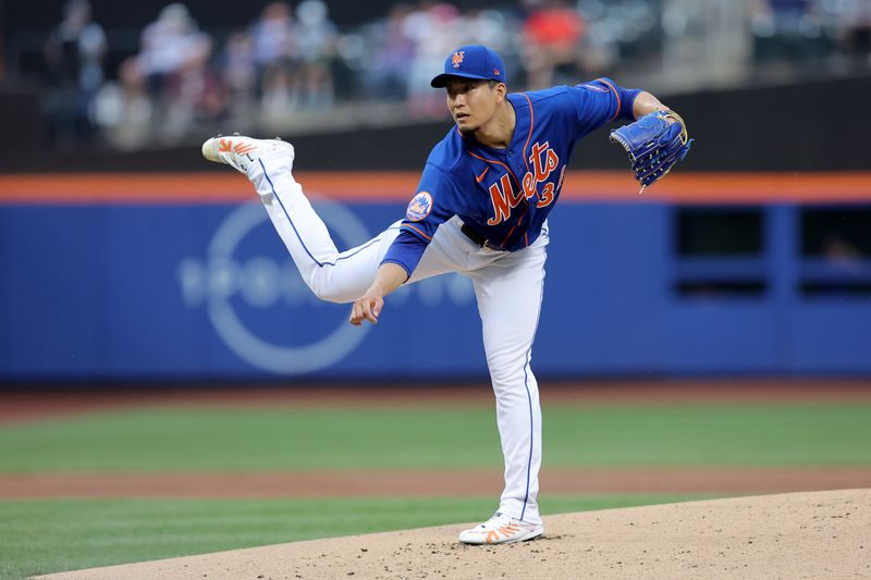 Jun 28, 2023; New York City, New York, USA; New York Mets starting pitcher Kodai Senga (34) follows through on a pitch against the Milwaukee Brewers during the first inning at Citi Field. Mandatory Credit: Brad Penner-USA TODAY Sports