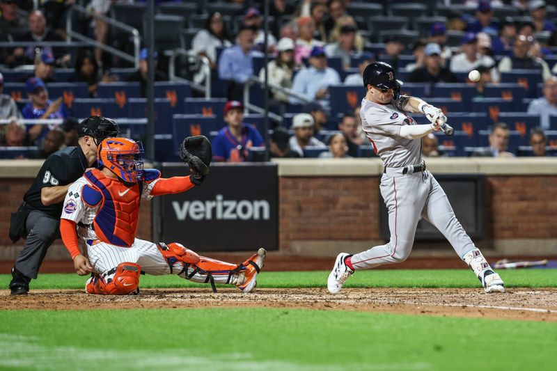 Sep 3, 2024; New York City, New York, USA;  Boston Red Sox second baseman Nick Sogard (75) hits an RBI single in the fifth inning against the New York Mets at Citi Field. Mandatory Credit: Wendell Cruz-Imagn Images