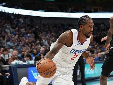 DALLAS, TX - DECEMBER 20: Kawhi Leonard #2 of the LA Clippers drives to the basket during the game against the Dallas Mavericks on December 20, 2023 at the American Airlines Center in Dallas, Texas. NOTE TO USER: User expressly acknowledges and agrees that, by downloading and or using this photograph, User is consenting to the terms and conditions of the Getty Images License Agreement. Mandatory Copyright Notice: Copyright 2023 NBAE (Photo by Glenn James/NBAE via Getty Images)