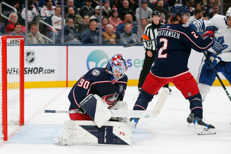 Oct 29, 2025; Columbus, Ohio, USA; Columbus Blue Jackets goalie Elvis Merzlikins (90) makes a save against the Toronto Maple Leafs during the first period at Nationwide Arena. Mandatory Credit: Russell LaBounty-Imagn Images