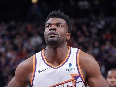 SACRAMENTO, CA - DECEMBER 22:  Udoka Azubuike #27 of the Phoenix Suns shoots a free throw during the game  on December 22, 2023 at Golden 1 Center in Sacramento, California. NOTE TO USER: User expressly acknowledges and agrees that, by downloading and or using this Photograph, user is consenting to the terms and conditions of the Getty Images License Agreement. Mandatory Copyright Notice: Copyright 2023 NBAE (Photo by Rocky Widner/NBAE via Getty Images)