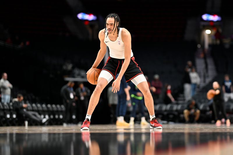 PORTLAND, OREGON - FEBRUARY 15: Dalano Banton #5 of the Portland Trail Blazers warms up before the game against the Minnesota Timberwolves at the Moda Center on February 15, 2024 in Portland, Oregon. NOTE TO USER: User expressly acknowledges and agrees that, by downloading and or using this photograph, User is consenting to the terms and conditions of the Getty Images License Agreement. (Photo by Alika Jenner/Getty Images)