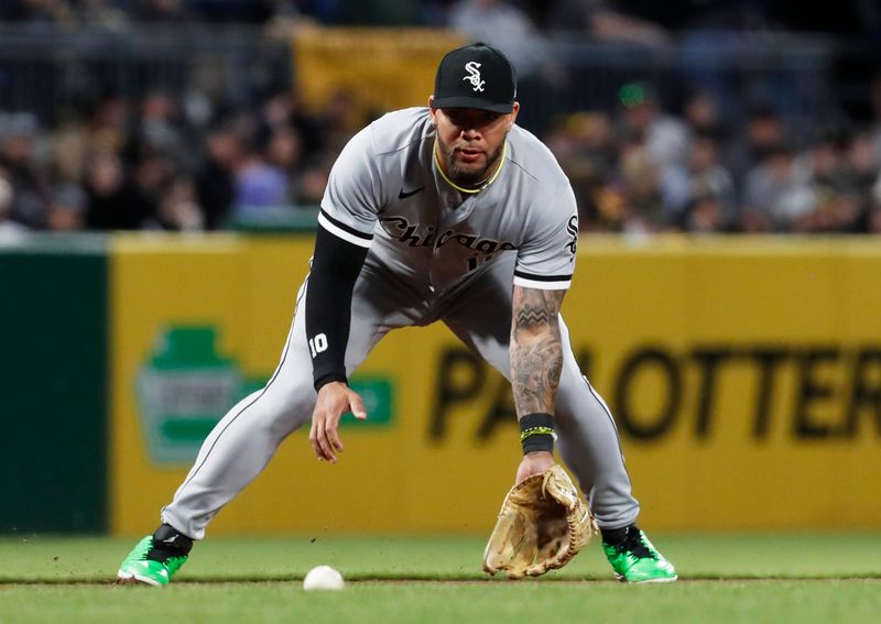 Apr 8, 2023; Pittsburgh, Pennsylvania, USA;  Chicago White Sox third baseman Yoan Moncada (10) fields a ground ball against the Pittsburgh Pirates during the fourth inning at PNC Park. Mandatory Credit: Charles LeClaire-USA TODAY Sports