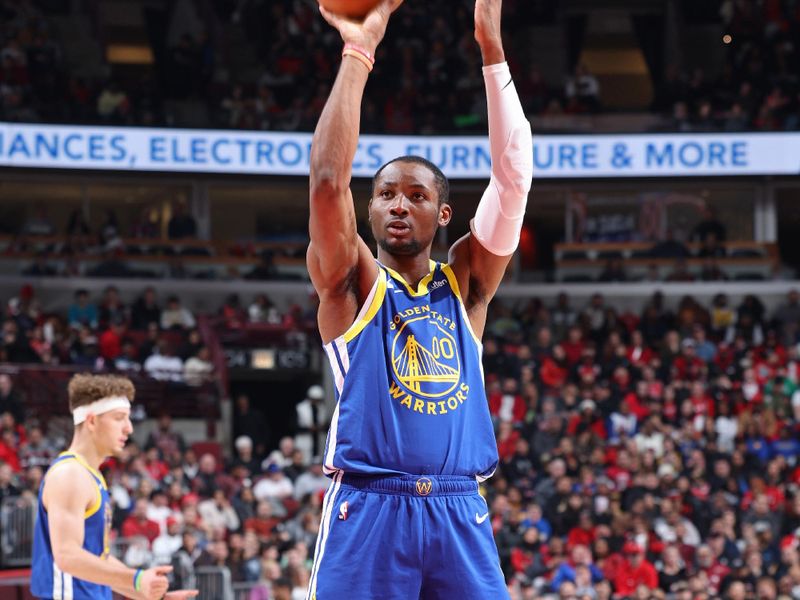 CHICAGO, IL - JANUARY 12: Jonathan Kuminga #00 of the Golden State Warriors shoots a free throw during the game against the Chicago Bulls on January 12, 2024 at United Center in Chicago, Illinois. NOTE TO USER: User expressly acknowledges and agrees that, by downloading and or using this photograph, User is consenting to the terms and conditions of the Getty Images License Agreement. Mandatory Copyright Notice: Copyright 2024 NBAE (Photo by Jeff Haynes/NBAE via Getty Images)