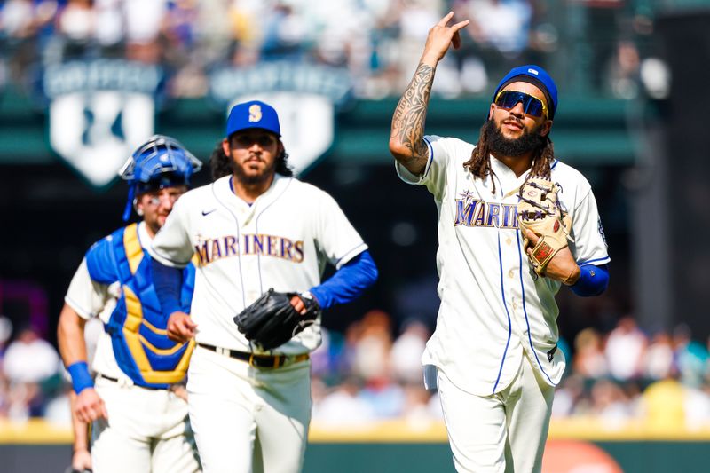 Aug 27, 2023; Seattle, Washington, USA; Seattle Mariners shortstop J.P. Crawford (3)  celebrates following a 3-2 victory against the Kansas City Royals at T-Mobile Park. Mandatory Credit: Joe Nicholson-USA TODAY Sports