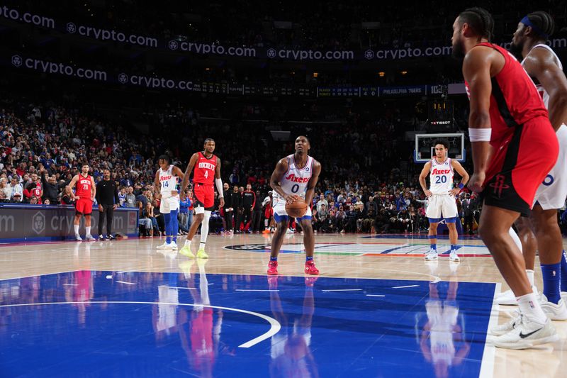 PHILADELPHIA, PA - NOVEMBER 27: Tyrese Maxey #0 of the Philadelphia 76ers shoots a free throw during the game against the Houston Rockets on November 27, 2024 at the Wells Fargo Center in Philadelphia, Pennsylvania NOTE TO USER: User expressly acknowledges and agrees that, by downloading and/or using this Photograph, user is consenting to the terms and conditions of the Getty Images License Agreement. Mandatory Copyright Notice: Copyright 2024 NBAE (Photo by Jesse D. Garrabrant/NBAE via Getty Images)