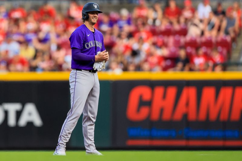 Jul 8, 2024; Cincinnati, Ohio, USA; Colorado Rockies designated hitter Ryan McMahon (24) reacts after a play in the fourth inning against the Cincinnati Reds at Great American Ball Park. Mandatory Credit: Katie Stratman-USA TODAY Sports