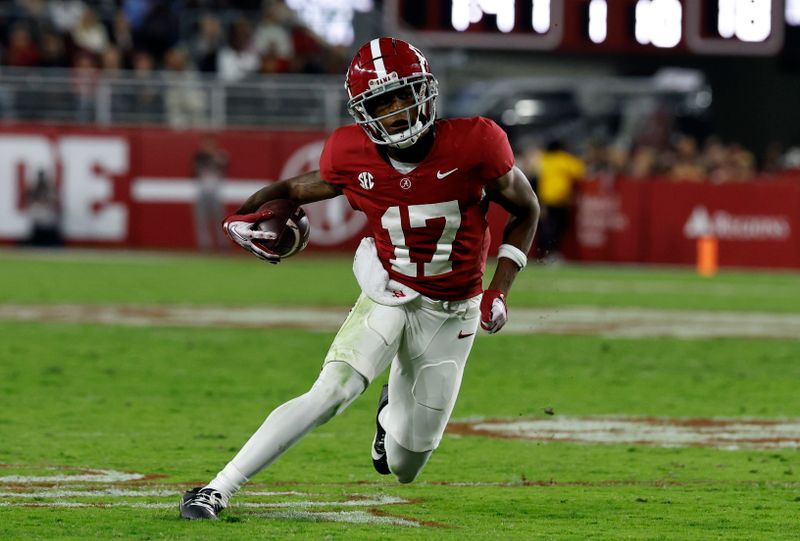 Nov 4, 2023; Tuscaloosa, Alabama, USA; Alabama Crimson Tide wide receiver Isaiah Bond (17) carries the ball against the LSU Tigers after a reception during the second half at Bryant-Denny Stadium. Mandatory Credit: Butch Dill-USA TODAY Sports