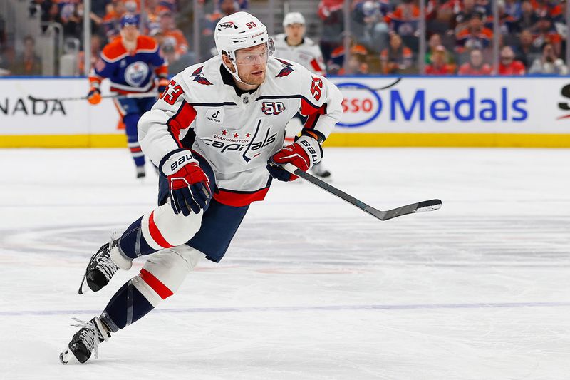 Jan 21, 2025; Edmonton, Alberta, CAN; Washington Capitals forward Ethen Frank (53) chases a loose puck against the Edmonton Oilers at Rogers Place. Mandatory Credit: Perry Nelson-Imagn Images