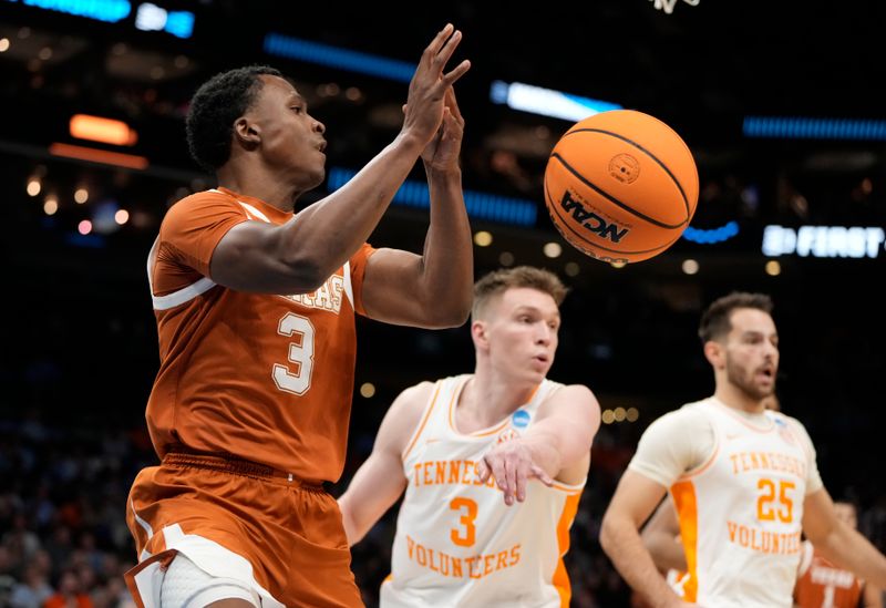 March 23, 2024, Charlotte, NC, USA; Texas Longhorns guard Max Abmas (3) loses the ball in front of Tennessee Volunteers guard Dalton Knecht (3) in the second round of the 2024 NCAA Tournament at the Spectrum Center. Mandatory Credit: Bob Donnan-USA TODAY Sports