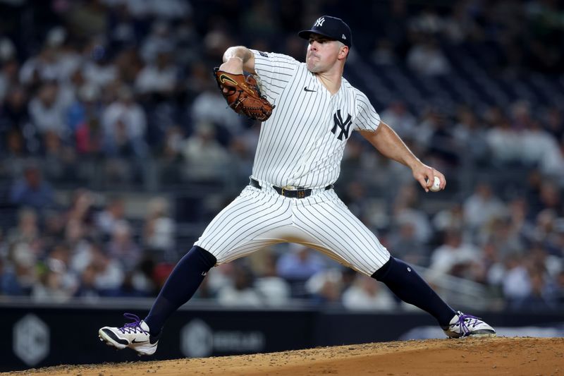 Sep 9, 2024; Bronx, New York, USA; New York Yankees starting pitcher Carlos Rodon (55) pitches against the Kansas City Royals during the third inning at Yankee Stadium. Mandatory Credit: Brad Penner-Imagn Images