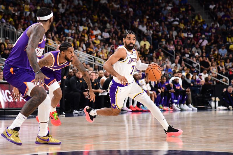 LOS ANGELES, CA - OCTOBER 6: Gabe Vincent #7 of the Los Angeles Lakers drives to the basket during the game against the Phoenix Suns on October 6, 2024 at Acrisure Arena in Palm Springs, California. NOTE TO USER: User expressly acknowledges and agrees that, by downloading and/or using this Photograph, user is consenting to the terms and conditions of the Getty Images License Agreement. Mandatory Copyright Notice: Copyright 2024 NBAE (Photo by Adam Pantozzi/NBAE via Getty Images)