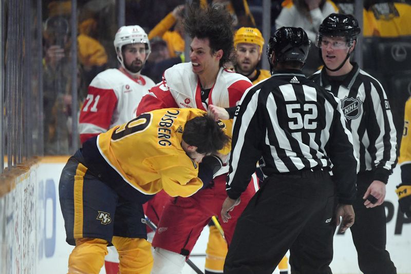 Mar 23, 2024; Nashville, Tennessee, USA; Detroit Red Wings defenseman Moritz Seider (53) and Nashville Predators left wing Filip Forsberg (9) fight during the second period at Bridgestone Arena. Mandatory Credit: Christopher Hanewinckel-USA TODAY Sports