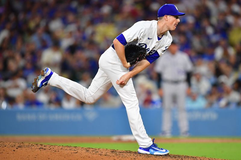 Aug 10, 2023; Los Angeles, California, USA; Los Angeles Dodgers relief pitcher Ryan Yarbrough (56) throws against the Colorado Rockies during the seventh inning at Dodger Stadium. Mandatory Credit: Gary A. Vasquez-USA TODAY Sports