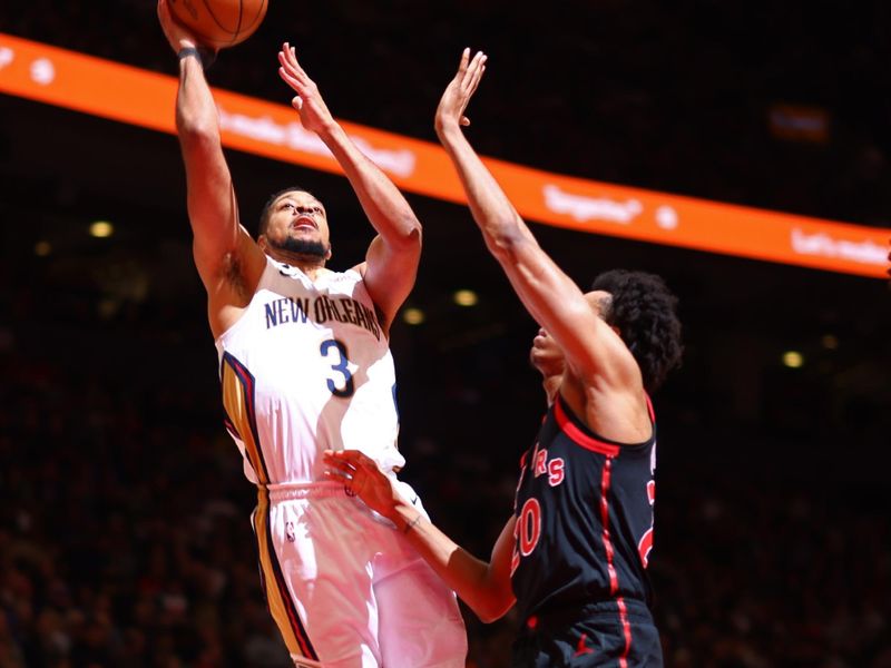 TORONTO, CANADA - FEBRUARY 23: CJ McCollum #3 of the New Orleans Pelicans shoots the ball against the Toronto Raptors on February 23, 2023 at the Scotiabank Arena in Toronto, Ontario, Canada.  NOTE TO USER: User expressly acknowledges and agrees that, by downloading and or using this Photograph, user is consenting to the terms and conditions of the Getty Images License Agreement.  Mandatory Copyright Notice: Copyright 2023 NBAE (Photo by Vaughn Ridley/NBAE via Getty Images)