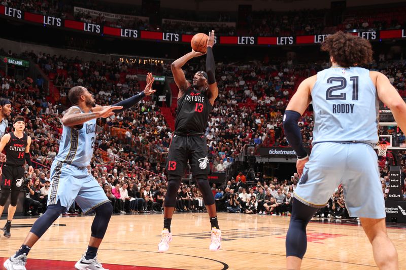 MIAMI, FL - JANUARY 24:  Bam Adebayo #13 of the Miami Heat shoots the ball during the game against the Memphis Grizzlies on January 24, 2024 at Kaseya Center in Miami, Florida. NOTE TO USER: User expressly acknowledges and agrees that, by downloading and or using this Photograph, user is consenting to the terms and conditions of the Getty Images License Agreement. Mandatory Copyright Notice: Copyright 2024 NBAE (Photo by Issac Baldizon/NBAE via Getty Images)