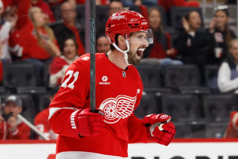 Oct 19, 2025; Detroit, Michigan, USA;  Detroit Red Wings center Dylan Larkin (71) reacts after scoring a goal against the Edmonton Oilers during the second period at Little Caesars Arena. Mandatory Credit: Rick Osentoski-Imagn Images