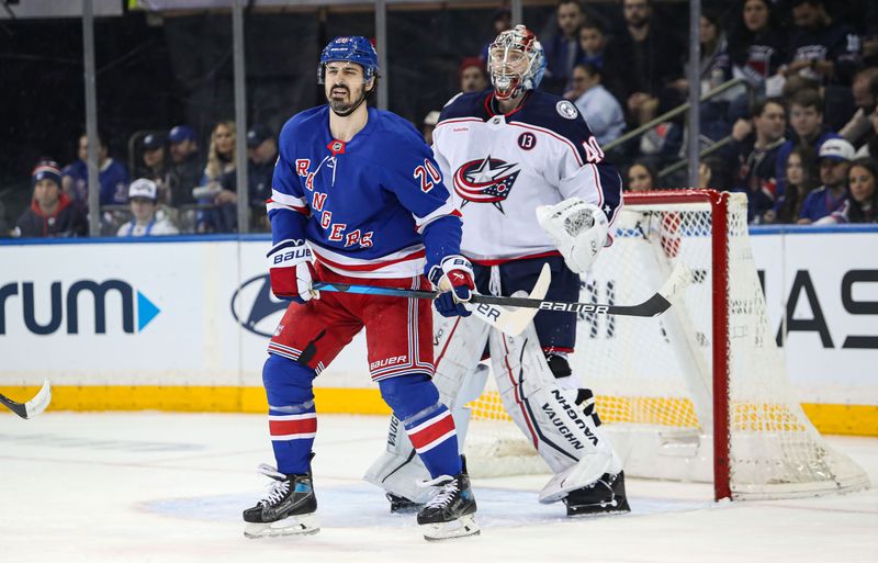 Jan 18, 2025; New York, New York, USA; New York Rangers left wing Chris Kreider (20) tries to screen Columbus Blue Jackets goalie Daniil Tarasov (40) on a power-play during the first period at Madison Square Garden. Mandatory Credit: Danny Wild-Imagn Images