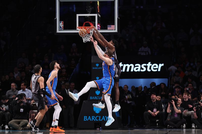 BROOKLYN, NY - FEBRUARY 26: Day'Ron Sharpe #20 of the Brooklyn Nets dunks the ball during the game against the Oklahoma City Thunder   on February 26, 2025 at Barclays Center in Brooklyn, New York. NOTE TO USER: User expressly acknowledges and agrees that, by downloading and or using this Photograph, user is consenting to the terms and conditions of the Getty Images License Agreement. Mandatory Copyright Notice: Copyright 2025 NBAE (Photo by Brandon Todd/NBAE via Getty Images)