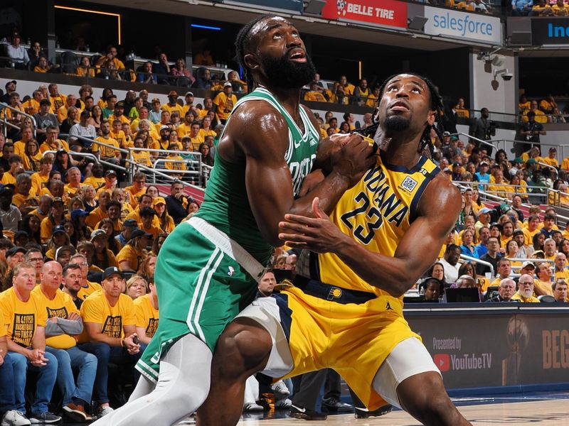 INDIANAPOLIS, IN - MAY 27: Jaylen Brown #7 of the Boston Celtics boxes out against Aaron Nesmith #23 of the Indiana Pacers during the game during Game 4 of the Eastern Conference Finals of the 2024 NBA Playoffs on May 27, 2024 at Gainbridge Fieldhouse in Indianapolis, Indiana. NOTE TO USER: User expressly acknowledges and agrees that, by downloading and or using this Photograph, user is consenting to the terms and conditions of the Getty Images License Agreement. Mandatory Copyright Notice: Copyright 2024 NBAE (Photo by Ron Hoskins/NBAE via Getty Images)