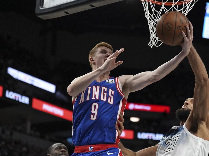 MINNEAPOLIS, MN -  NOVEMBER 27:  Kevin Huerter #9 of the Sacramento Kings shoots the ball during the game against the Minnesota Timberwolves on November 27, 2024 at Target Center in Minneapolis, Minnesota. NOTE TO USER: User expressly acknowledges and agrees that, by downloading and or using this Photograph, user is consenting to the terms and conditions of the Getty Images License Agreement. Mandatory Copyright Notice: Copyright 2024 NBAE (Photo by Jordan Johnson/NBAE via Getty Images)