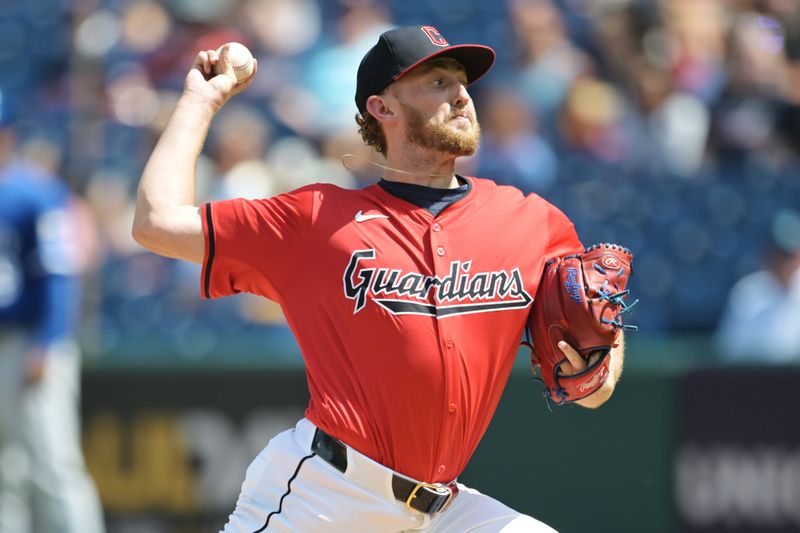 Aug 28, 2024; Cleveland, Ohio, USA; Cleveland Guardians starting pitcher Tanner Bibee (28) throws a pitch during the first inning against the Kansas City Royals at Progressive Field. Mandatory Credit: Ken Blaze-USA TODAY Sports