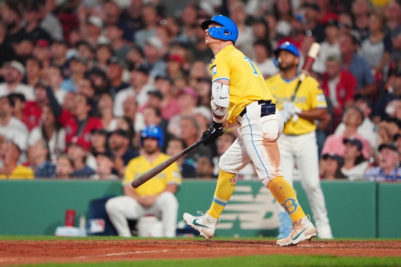 Jul 27, 2024; Boston, Massachusetts, USA; Boston Red Sox left fielder Tyler O'Neill (17) watches his home run against the New York Yankees during the seventh inning at Fenway Park. Mandatory Credit: Gregory Fisher-USA TODAY Sports