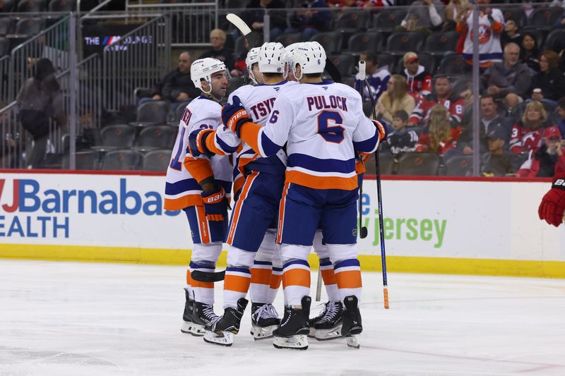 Oct 25, 2024; Newark, New Jersey, USA; New York Islanders center Brock Nelson (29) celebrates his goal against the New Jersey Devils during the first period at Prudential Center. Mandatory Credit: Ed Mulholland-Imagn Images