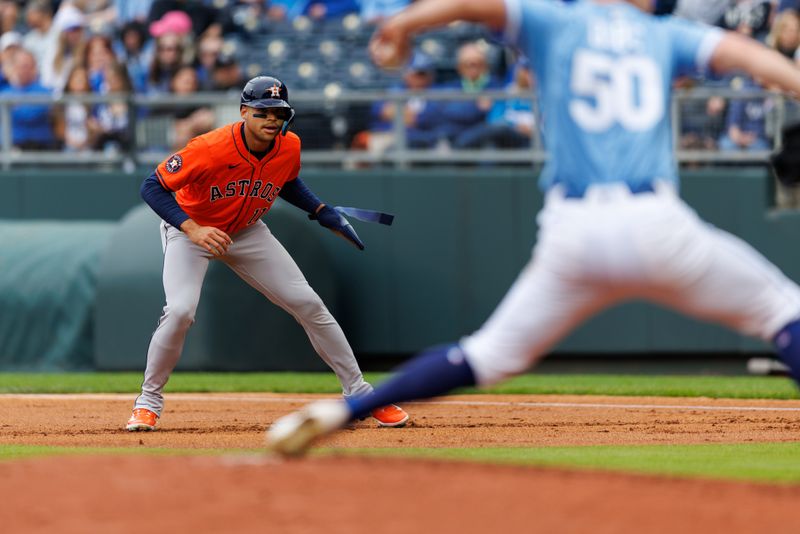 Apr 27, 2025; Kansas City, Missouri, USA; Houston Astros catcher Victor Caratini (17) leads off during the second inning against the Kansas City Royals at Kauffman Stadium. Mandatory Credit: William Purnell-Imagn Images
