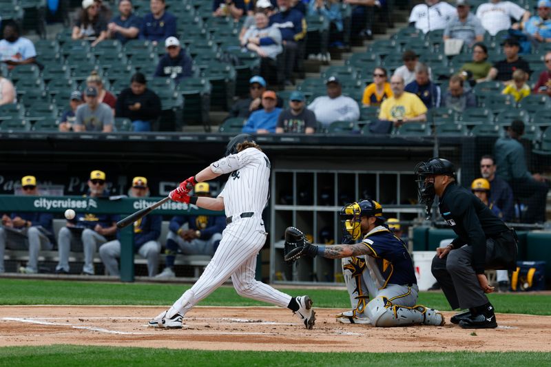 May 1, 2025; Chicago, Illinois, USA; Chicago White Sox shortstop Chase Meidroth (10) doubles against the Milwaukee Brewers during the first inning at Rate Field. Mandatory Credit: Kamil Krzaczynski-Imagn Images