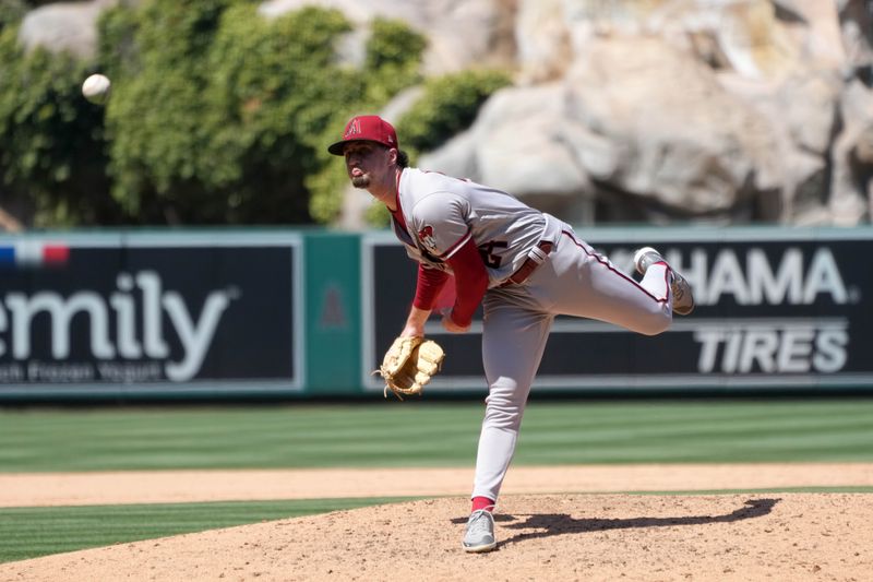 Jul 2, 2023; Anaheim, California, USA; Arizona Diamondbacks relief pitcher Kyle Nelson (24) throws in the eighth inning against the Los Angeles Angels at Angel Stadium. Mandatory Credit: Kirby Lee-USA TODAY Sports