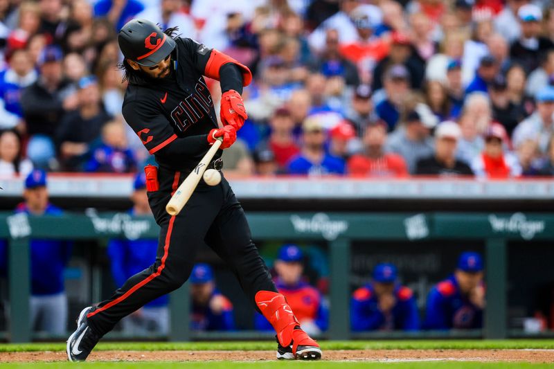 May 23, 2025; Cincinnati, Ohio, USA; Cincinnati Reds outfielder Connor Joe (17) hits a single in the third inning against the Chicago Cubs at Great American Ball Park. Mandatory Credit: Katie Stratman-Imagn Images