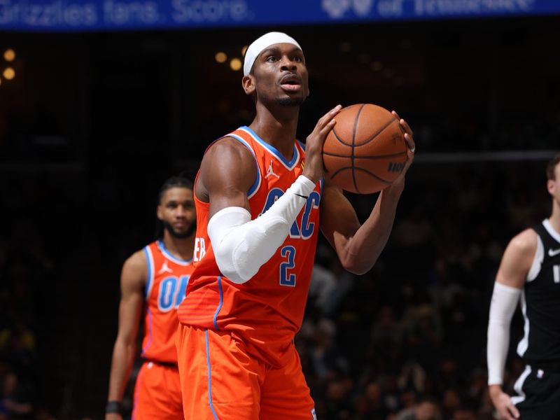 MEMPHIS, TN - MARCH 16:  Shai Gilgeous-Alexander #2 of the Oklahoma City Thunder shoots a free throw during the game against the Memphis Grizzlies on March 16, 2024 at FedExForum in Memphis, Tennessee. NOTE TO USER: User expressly acknowledges and agrees that, by downloading and or using this photograph, User is consenting to the terms and conditions of the Getty Images License Agreement. Mandatory Copyright Notice: Copyright 2024 NBAE (Photo by Joe Murphy/NBAE via Getty Images)