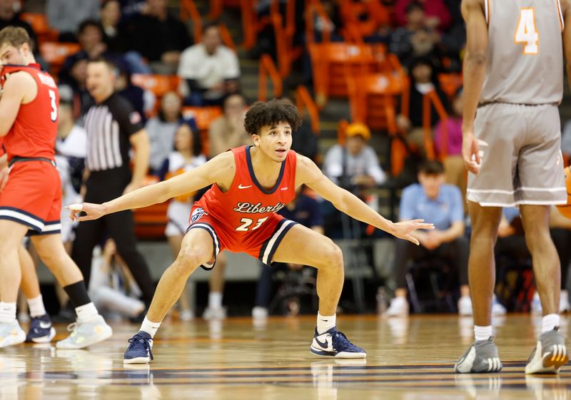 Feb 3, 2024; El Paso, Texas, USA; Liberty University Flames guard Joseph Venzant (23) gets in position to play defenses against the UTEP Miners in the first half at Don Haskins Center. Mandatory Credit: Ivan Pierre Aguirre-USA TODAY Sports