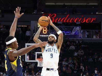 MINNEAPOLIS, MN -  DECEMBER 16: Nickeil Alexander-Walker #9 of the Minnesota Timberwolves shoots the ball during the game against the Indiana Pacers on December 16 , 2023 at Target Center in Minneapolis, Minnesota. NOTE TO USER: User expressly acknowledges and agrees that, by downloading and or using this Photograph, user is consenting to the terms and conditions of the Getty Images License Agreement. Mandatory Copyright Notice: Copyright 2023 NBAE (Photo by David Sherman/NBAE via Getty Images)