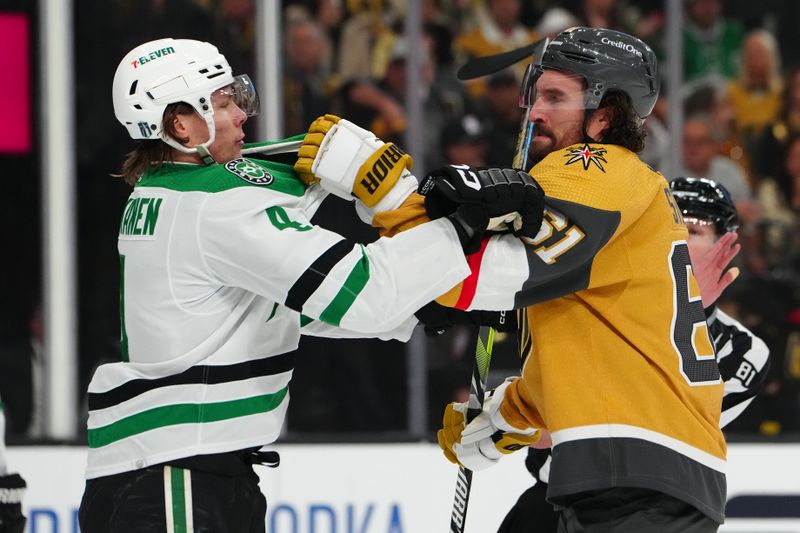 Apr 29, 2024; Las Vegas, Nevada, USA; Dallas Stars defenseman Miro Heiskanen (4) and Vegas Golden Knights right wing Mark Stone (61) grab each others jerseys during the first period of game four of the first round of the 2024 Stanley Cup Playoffs at T-Mobile Arena. Mandatory Credit: Stephen R. Sylvanie-USA TODAY Sports