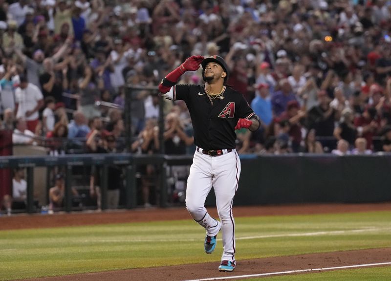 Aug 26, 2023; Phoenix, Arizona, USA; Arizona Diamondbacks second baseman Ketel Marte (4) runs the bases after hitting a three run home run against the Cincinnati Reds during the fifth inning at Chase Field. Mandatory Credit: Joe Camporeale-USA TODAY Sports