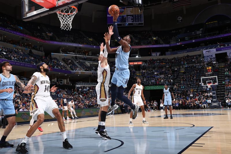 MEMPHIS, TN - FEBRUARY 12: Jaren Jackson Jr. #13 of the Memphis Grizzlies drives to the basket during the game against the New Orleans Pelicans on February 12, 2024 at FedExForum in Memphis, Tennessee. NOTE TO USER: User expressly acknowledges and agrees that, by downloading and or using this photograph, User is consenting to the terms and conditions of the Getty Images License Agreement. Mandatory Copyright Notice: Copyright 2024 NBAE (Photo by Joe Murphy/NBAE via Getty Images)