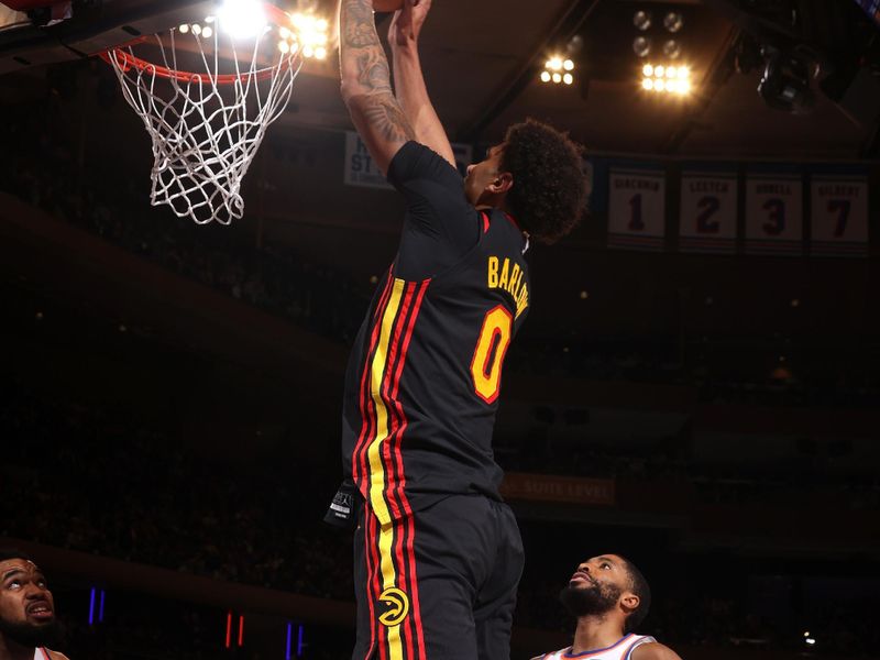 NEW YORK, NY - FEBRUARY 12: Dominick Barlow #0 of the Atlanta Hawks dunks the ball during the game against the New York Knicks on February 12, 2025 at Madison Square Garden in New York City, New York.  NOTE TO USER: User expressly acknowledges and agrees that, by downloading and or using this photograph, User is consenting to the terms and conditions of the Getty Images License Agreement. Mandatory Copyright Notice: Copyright 2025 NBAE(Photo by Nathaniel S. Butler/NBAE via Getty Images)