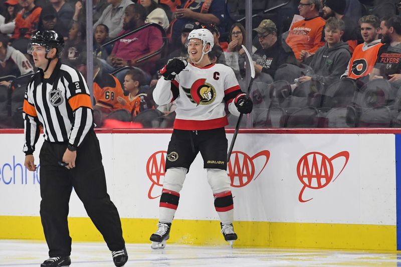 Mar 11, 2025; Philadelphia, Pennsylvania, USA; Ottawa Senators left wing Brady Tkachuk (7) celebrates his goal  against the Philadelphia Flyers during the first period at Wells Fargo Center. Mandatory Credit: Eric Hartline-Imagn Images