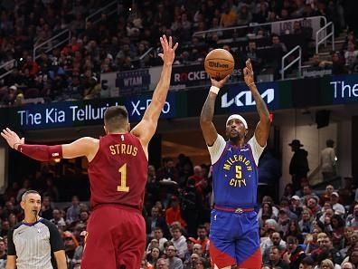 CLEVELAND, OH - NOVEMBER 19: Kentavious Caldwell-Pope #5 of the Denver Nuggets shoots a three point basket during the game against the Cleveland Cavaliers on November 19, 2023 at Rocket Mortgage FieldHouse in Cleveland, Ohio. NOTE TO USER: User expressly acknowledges and agrees that, by downloading and/or using this Photograph, user is consenting to the terms and conditions of the Getty Images License Agreement. Mandatory Copyright Notice: Copyright 2023 NBAE (Photo by Lauren Leigh Bacho/NBAE via Getty Images)