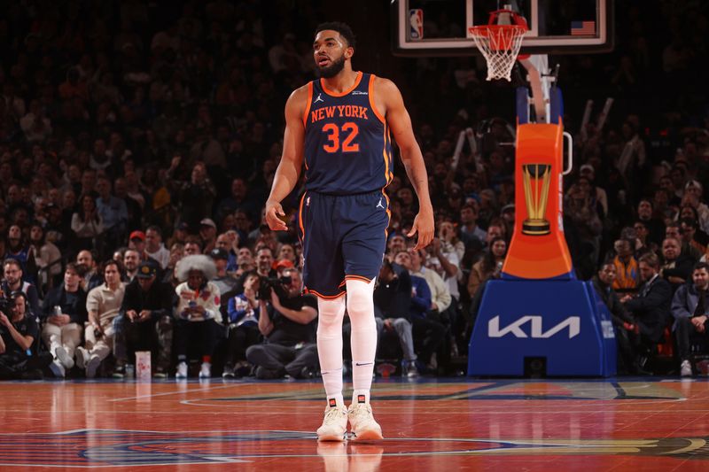 NEW YORK, NY - DECEMBER 3: Karl-Anthony Towns #32 of the New York Knicks looks on during the game against the Orlando Magic during the Emirates NBA Cup on December 3, 2024 at Madison Square Garden in New York City, New York.  NOTE TO USER: User expressly acknowledges and agrees that, by downloading and or using this photograph, User is consenting to the terms and conditions of the Getty Images License Agreement. Mandatory Copyright Notice: Copyright 2024 NBAE  (Photo by Nathaniel S. Butler/NBAE via Getty Images)