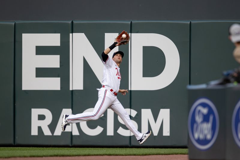 May 23, 2023; Minneapolis, Minnesota, USA; Minnesota Twins right fielder Alex Kirilloff (19) catches a fly ball in the fourth inning against the San Francisco Giants at Target Field. Mandatory Credit: Jesse Johnson-USA TODAY Sports