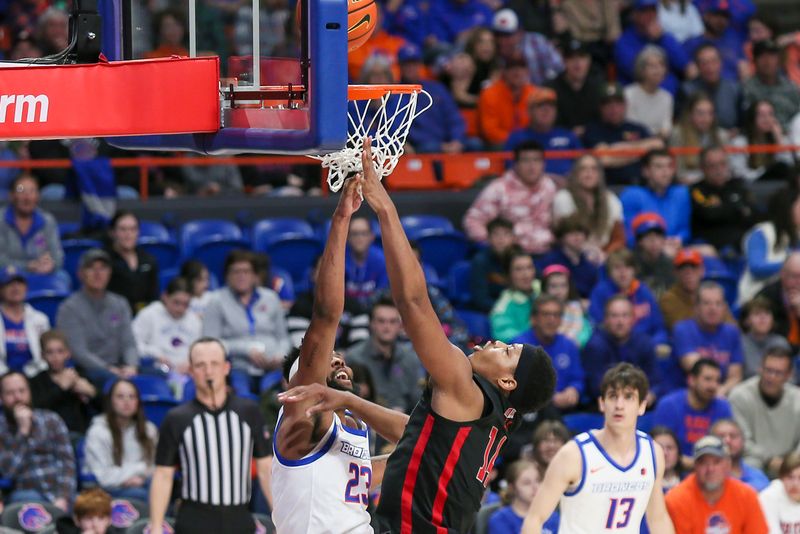 Feb 19, 2023; Boise, Idaho, USA Boise State Broncos forward Naje Smith (23)  and UNLV Rebels guard Keyshawn Hall (14) fight for rebound during the first half at ExtraMile Arena  Mandatory Credit: Brian Losness-USA TODAY Sports

Feb 19, 2023; Boise, Idaho, USA; xxxx during the first half against the Boise State Broncos at ExtraMile Arena. Mandatory Credit: Brian Losness-USA TODAY Sports
