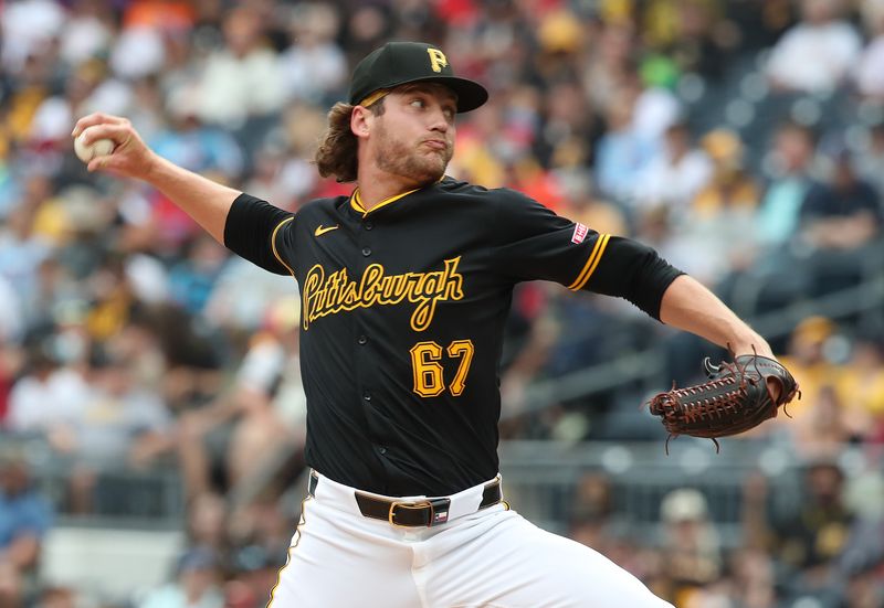Jun 8, 2025; Pittsburgh, Pennsylvania, USA; Pittsburgh Pirates relief pitcher Braxton Ashcraft (67) pitches against the Philadelphia Phillies during the eighth inning at PNC Park. Mandatory Credit: Charles LeClaire-Imagn Images