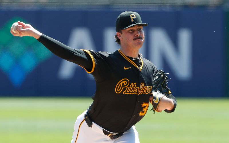 Aug 28, 2024; Pittsburgh, Pennsylvania, USA;  Pittsburgh Pirates starting pitcher Paul Skenes (30) delivers a pitch against the Chicago Cubs during the first inning at PNC Park. Mandatory Credit: Charles LeClaire-USA TODAY Sports