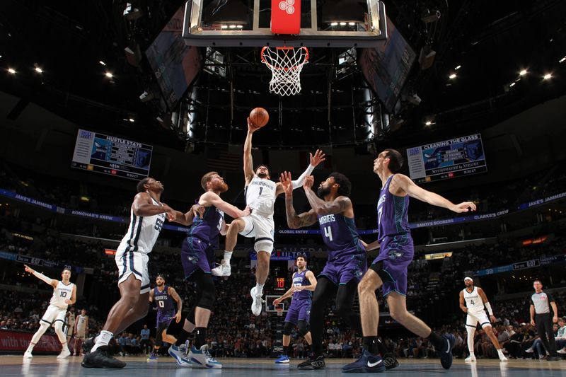 MEMPHIS, TN - MARCH 13: Scotty Pippen Jr. #1 of the Memphis Grizzlies drives to the basket during the game against the Charlotte Hornets on March 13, 2024 at FedExForum in Memphis, Tennessee. NOTE TO USER: User expressly acknowledges and agrees that, by downloading and or using this photograph, User is consenting to the terms and conditions of the Getty Images License Agreement. Mandatory Copyright Notice: Copyright 2024 NBAE (Photo by Joe Murphy/NBAE via Getty Images)